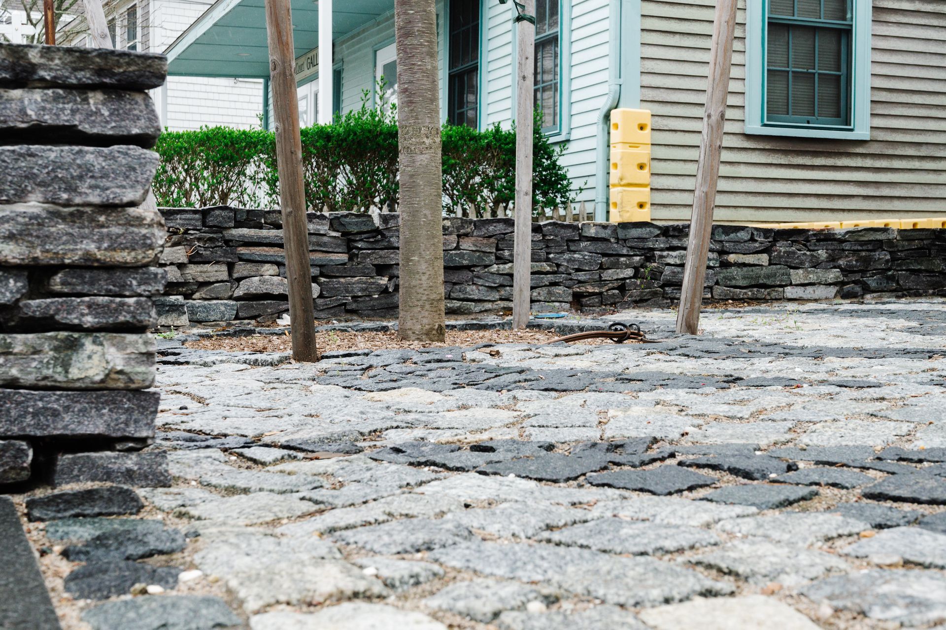 A house with a stone walkway in front of it