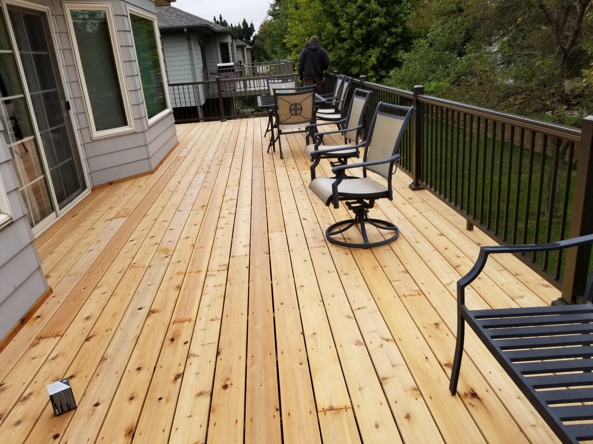Cedar floor deck with composite railings