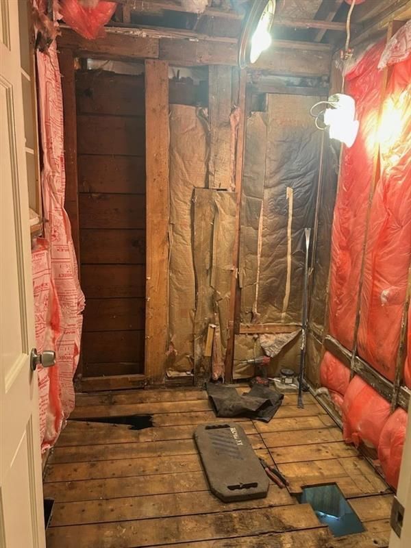 A room with a lot of insulation on the walls and floor.