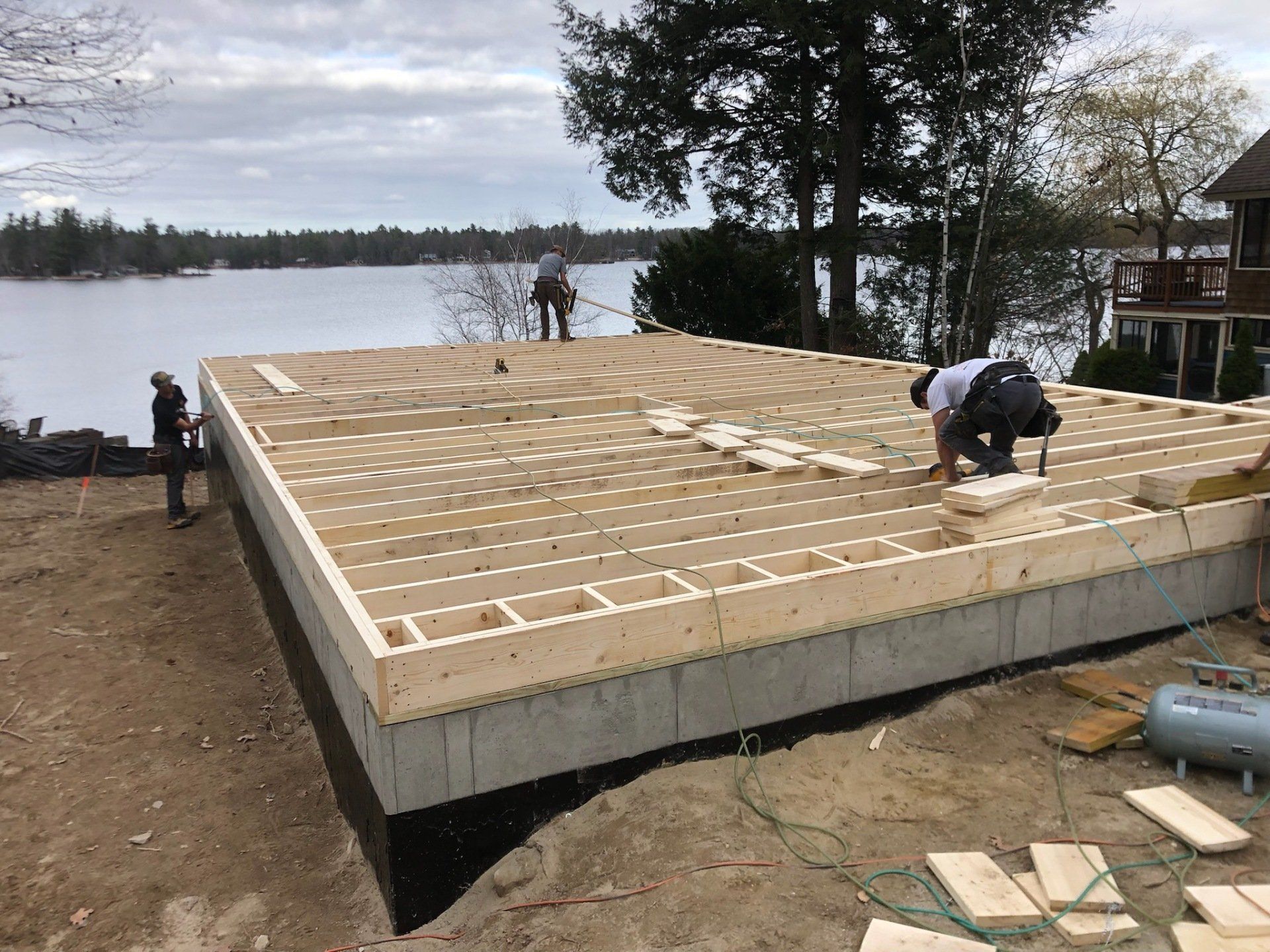 house construction by the lake