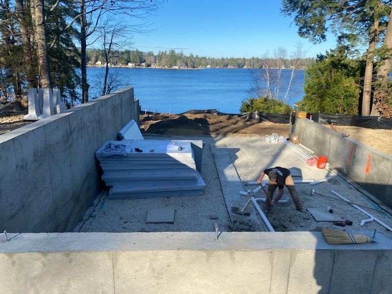 cemented house building by the lake