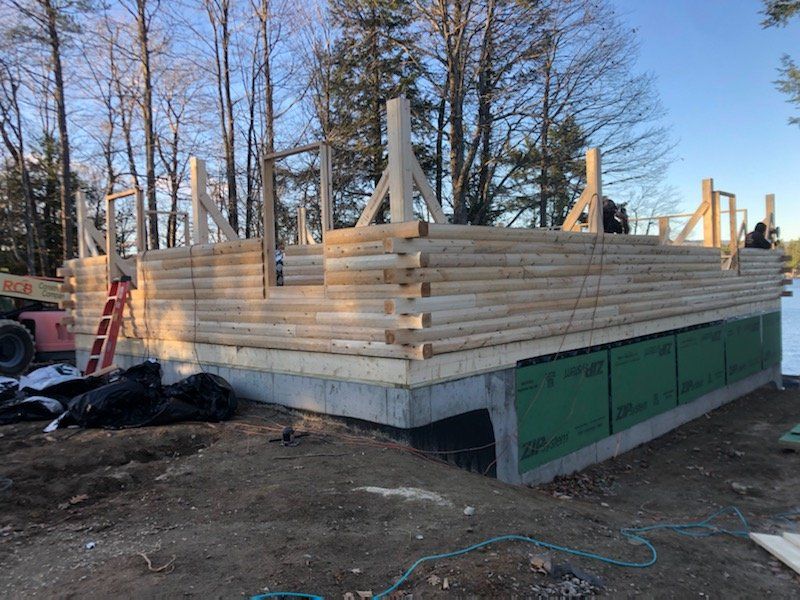 house construction by the lake halfway built