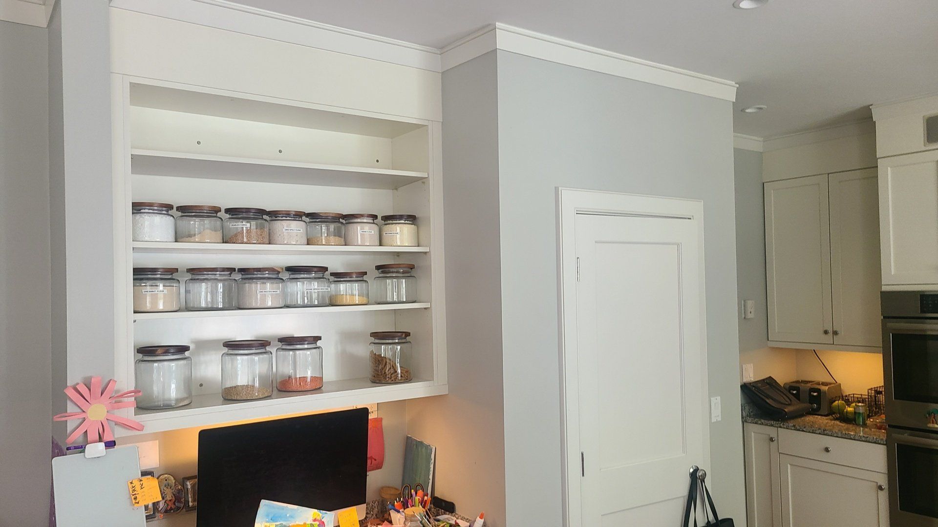 white condiments open cabinet