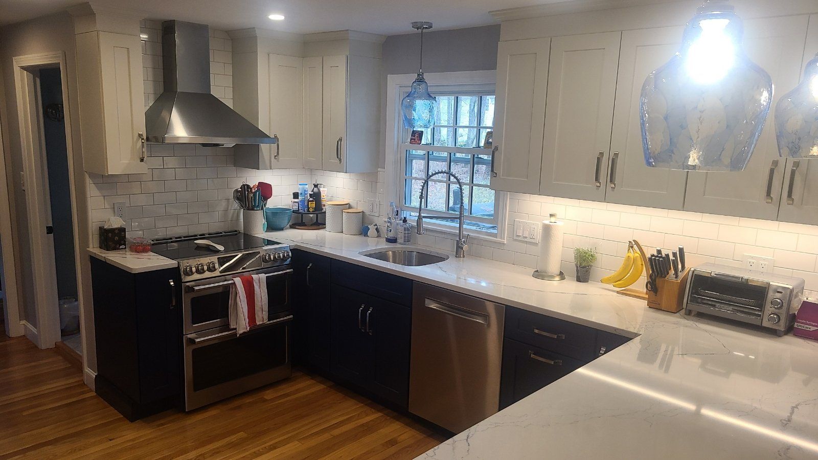 Kitchen with Stainless Range Hood