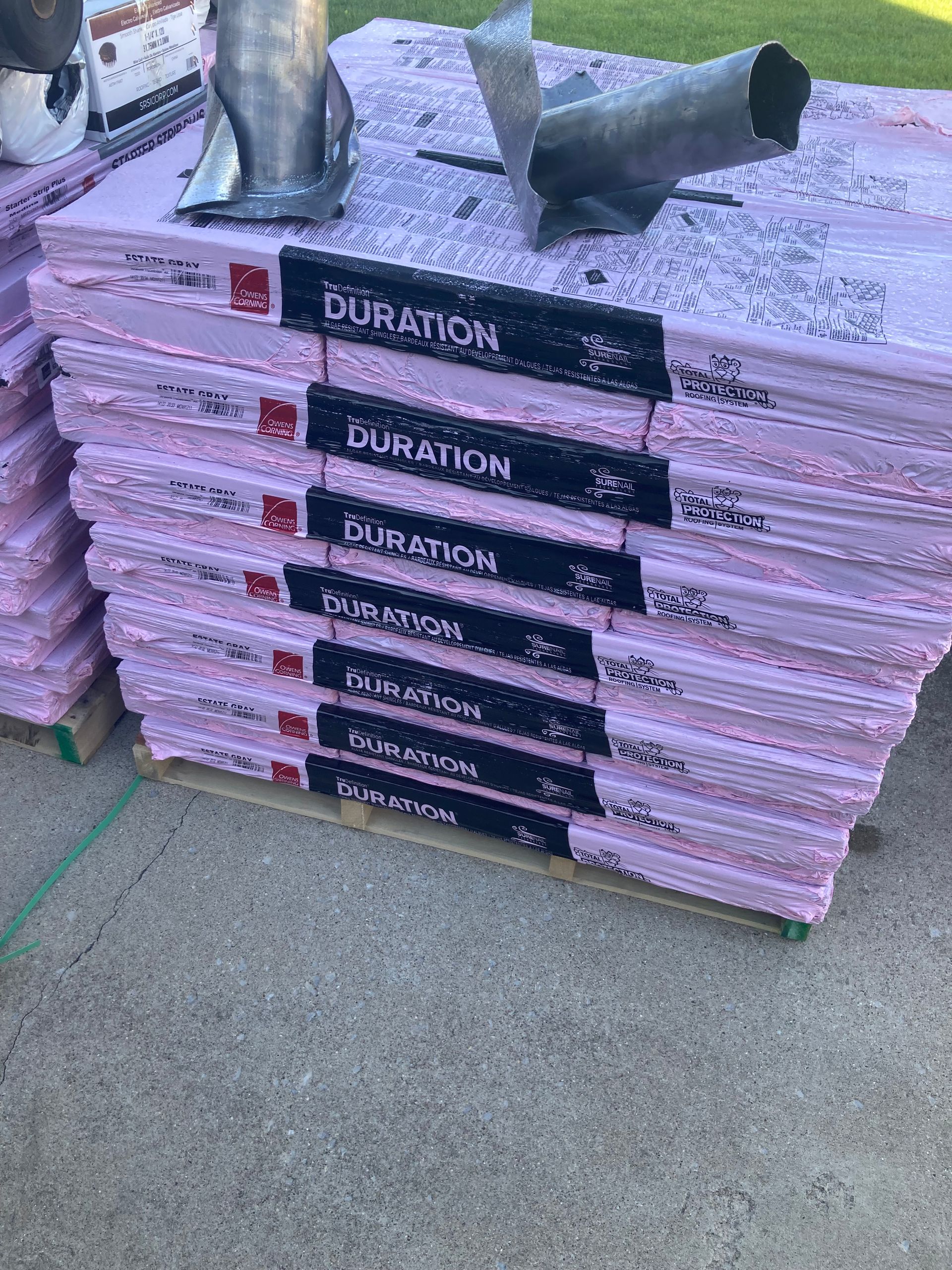 Stack of pink insulation boards labeled 