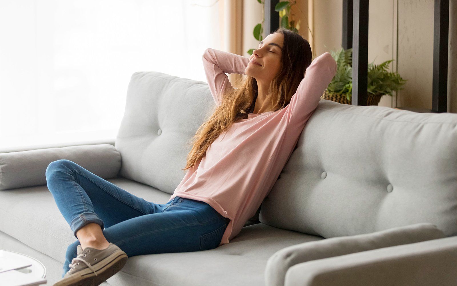 Woman relaxing in sofa
