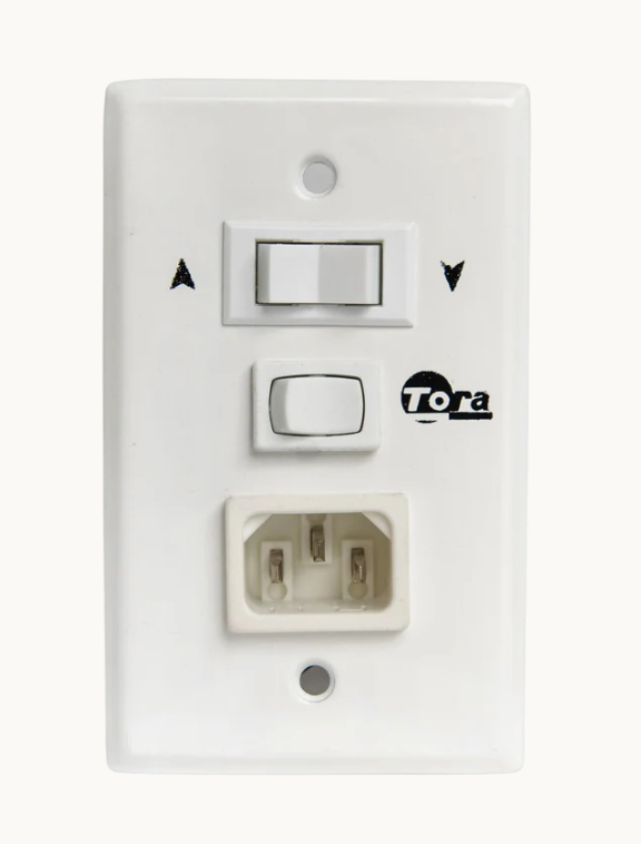 White wall switch panel with up/down arrows and an electrical outlet below