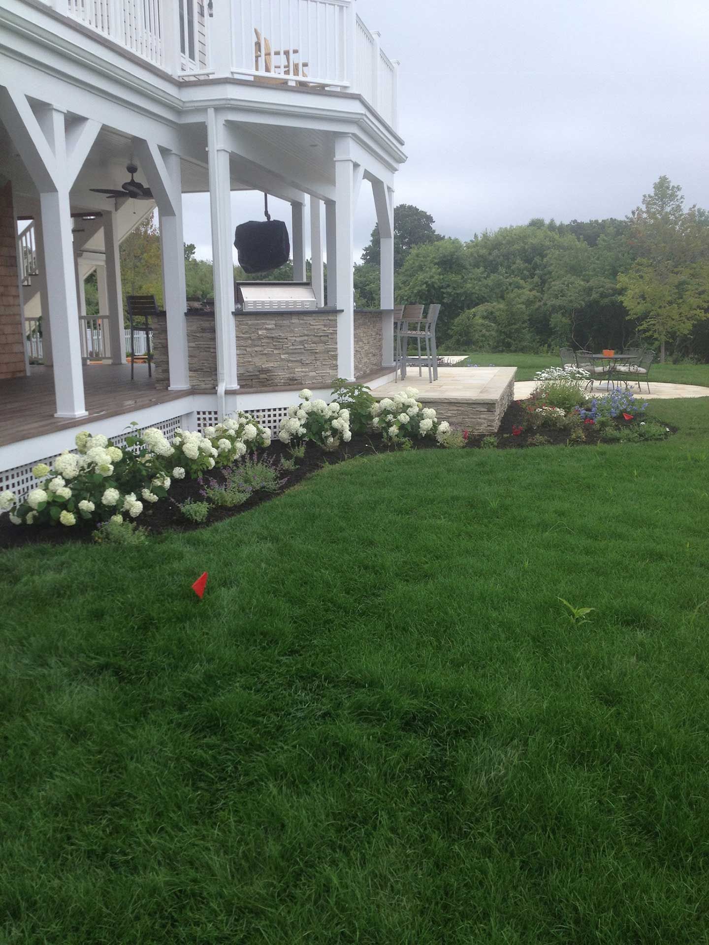 a large house with a large lawn in front of it