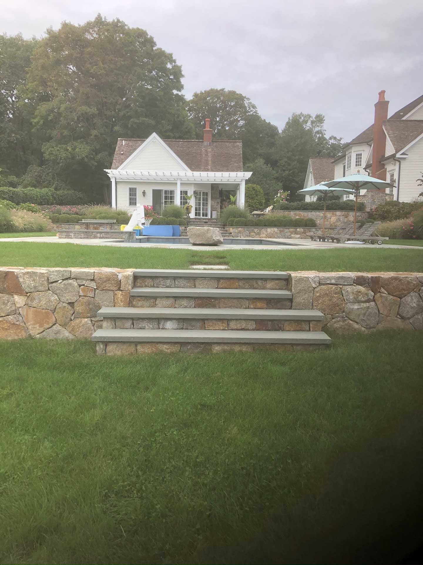 stairs leading up to a house in the background