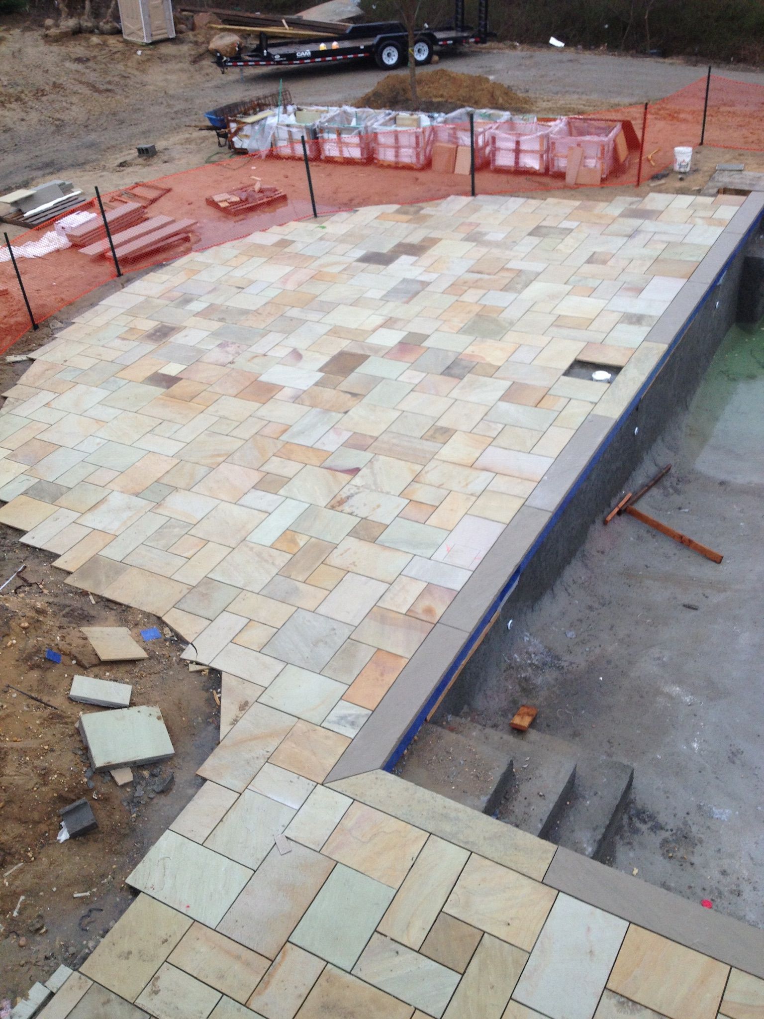 an aerial view of a swimming pool under construction