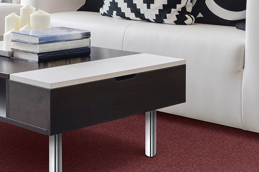 A living room with a couch and a coffee table