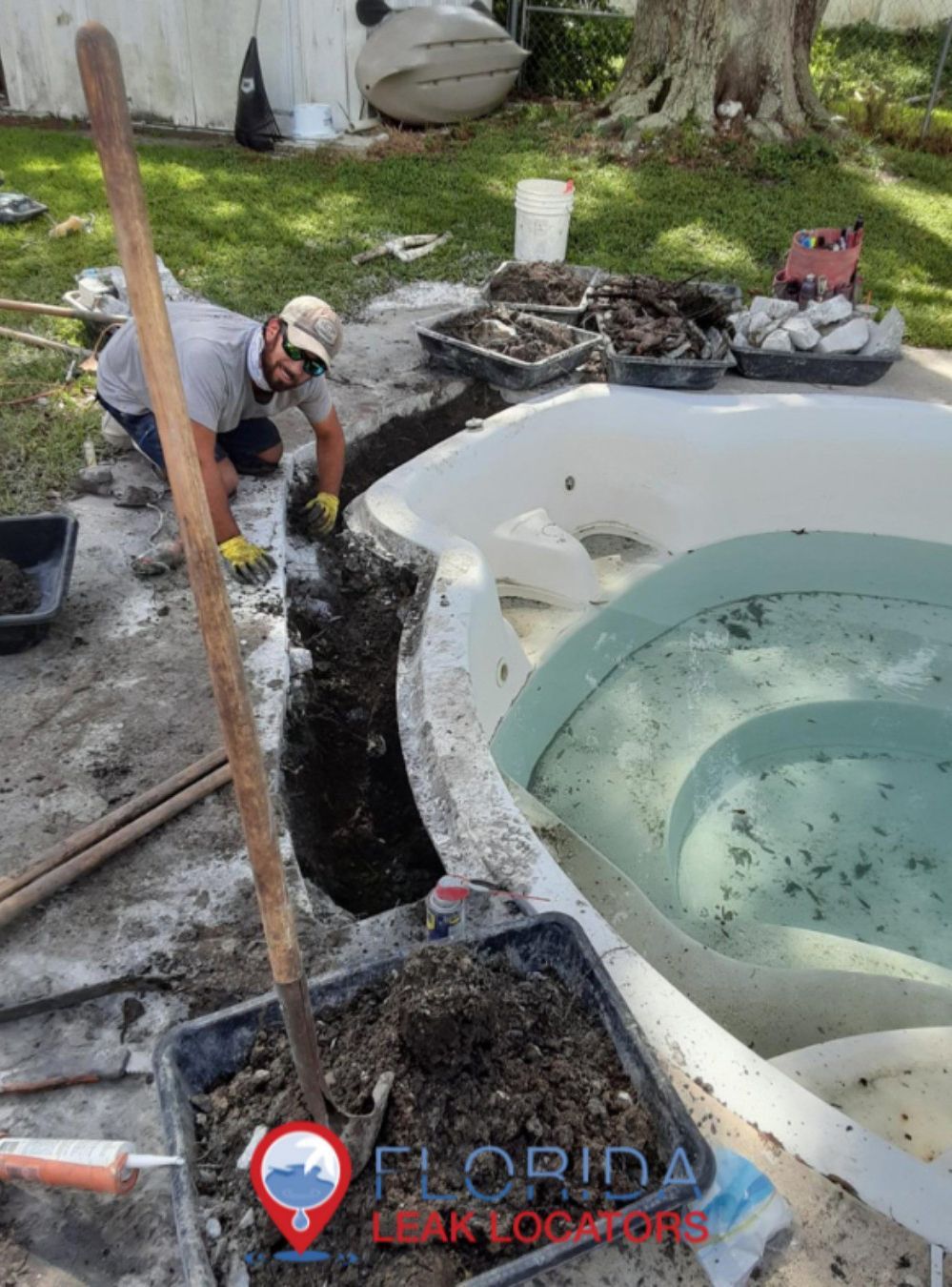 a man is working on a hot tub in florida