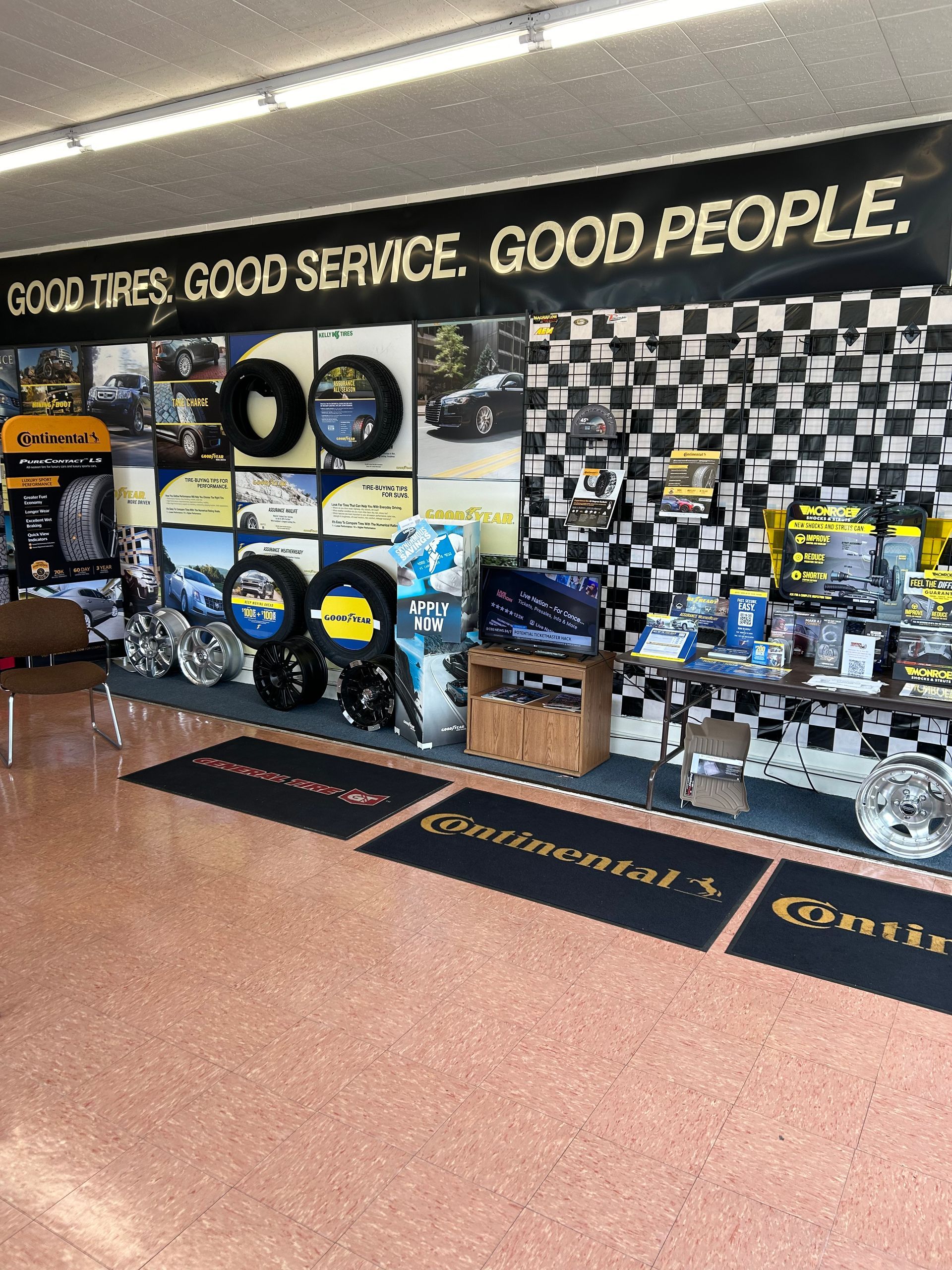 A store with a sign that says good tires good service good people