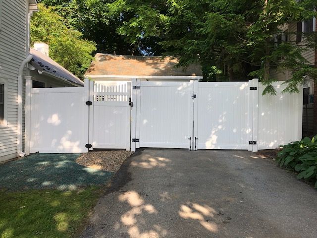 Newly constructed white fence