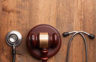 Stethoscope and judgement hammer