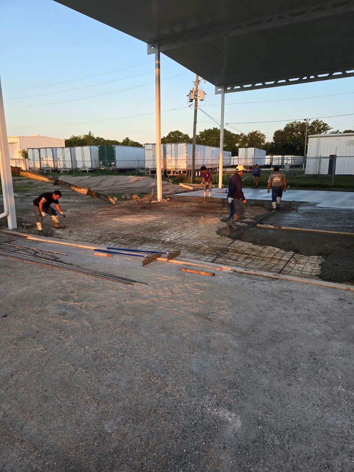 A group of people are working on a construction site.