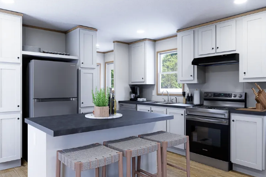 Modern white kitchen with black countertops, stainless appliances, and a central island with stools