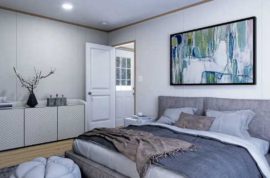 Bright bedroom with gray bed, open door, dresser, and abstract wall art