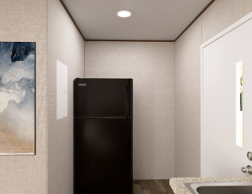 Narrow modern kitchen with black fridge, white walls, and a sink by the window.