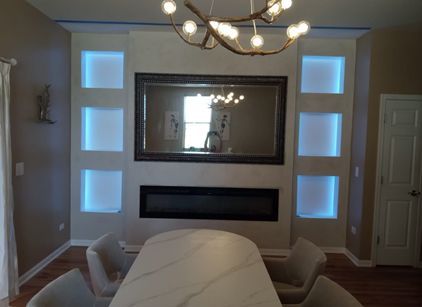 A dining room with an accent wall