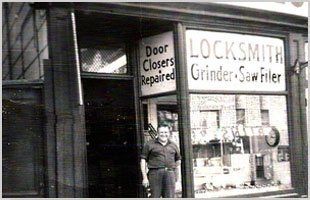 Man in front of the locksmith shop