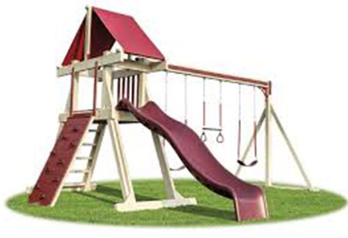 A wooden playground set with a red slide and swings