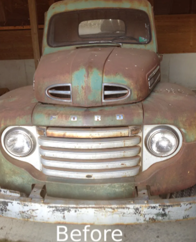 Rusty old green pickup truck front view with rounded hood and chrome grille, labeled 