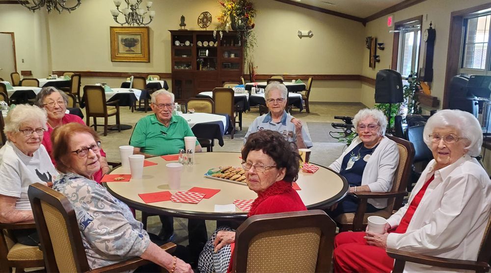 Residents gathered around a table