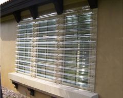 Window with clear corrugated panels