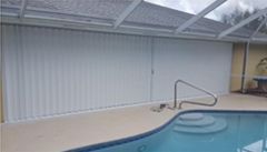 Outdoor area with accordion shutters