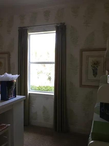 There is a large window in the middle of the room.