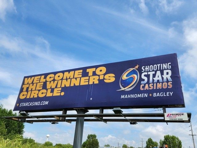 A billboard that says welcome to the winner 's circle