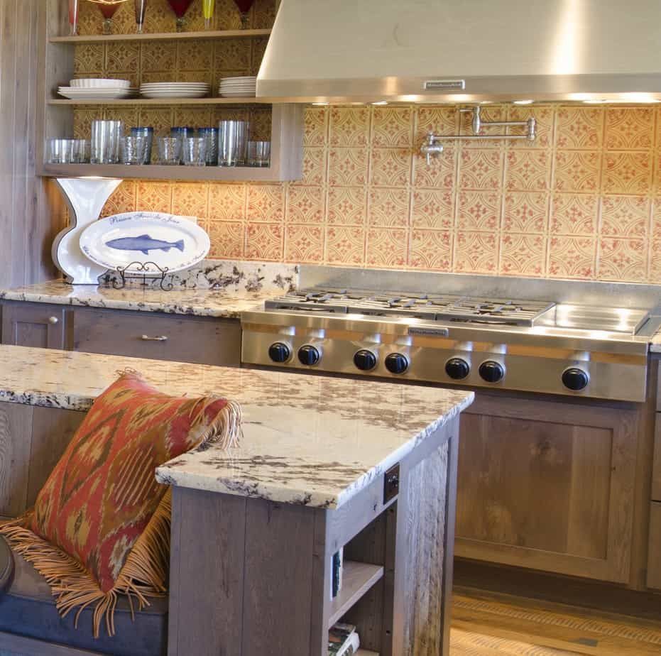 A kitchen with stainless steel appliances and granite counter tops