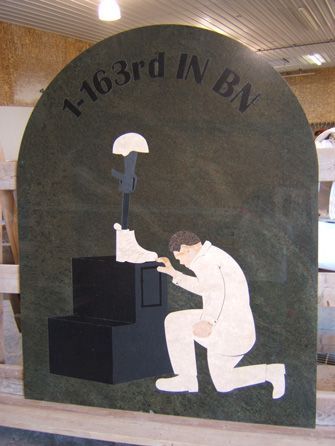 A sign that says 1-163rd in bn on it