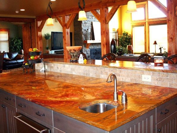 A kitchen with granite counter tops and a sink