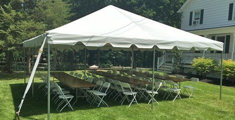Tent, tables, and chairs