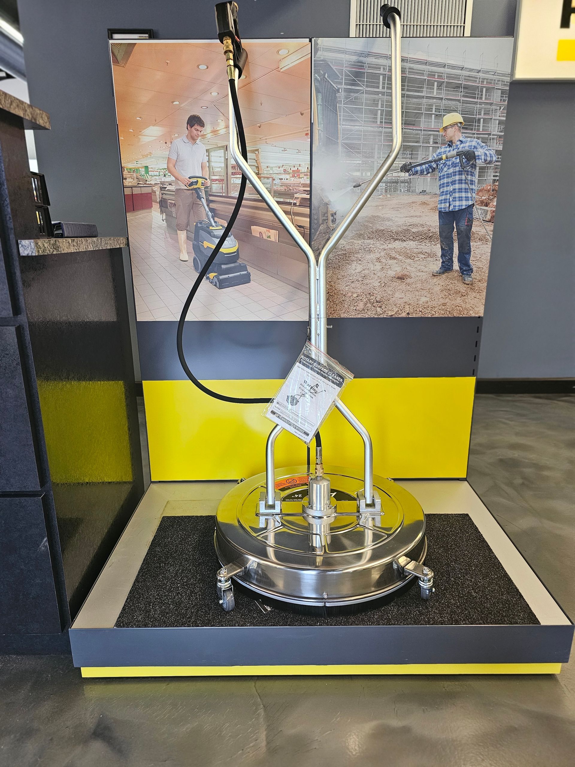 A stainless steel machine is on display in a store