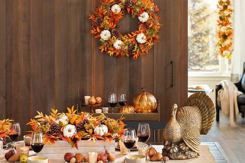 Thanksgiving turkey with leaf and pumpkin decorations