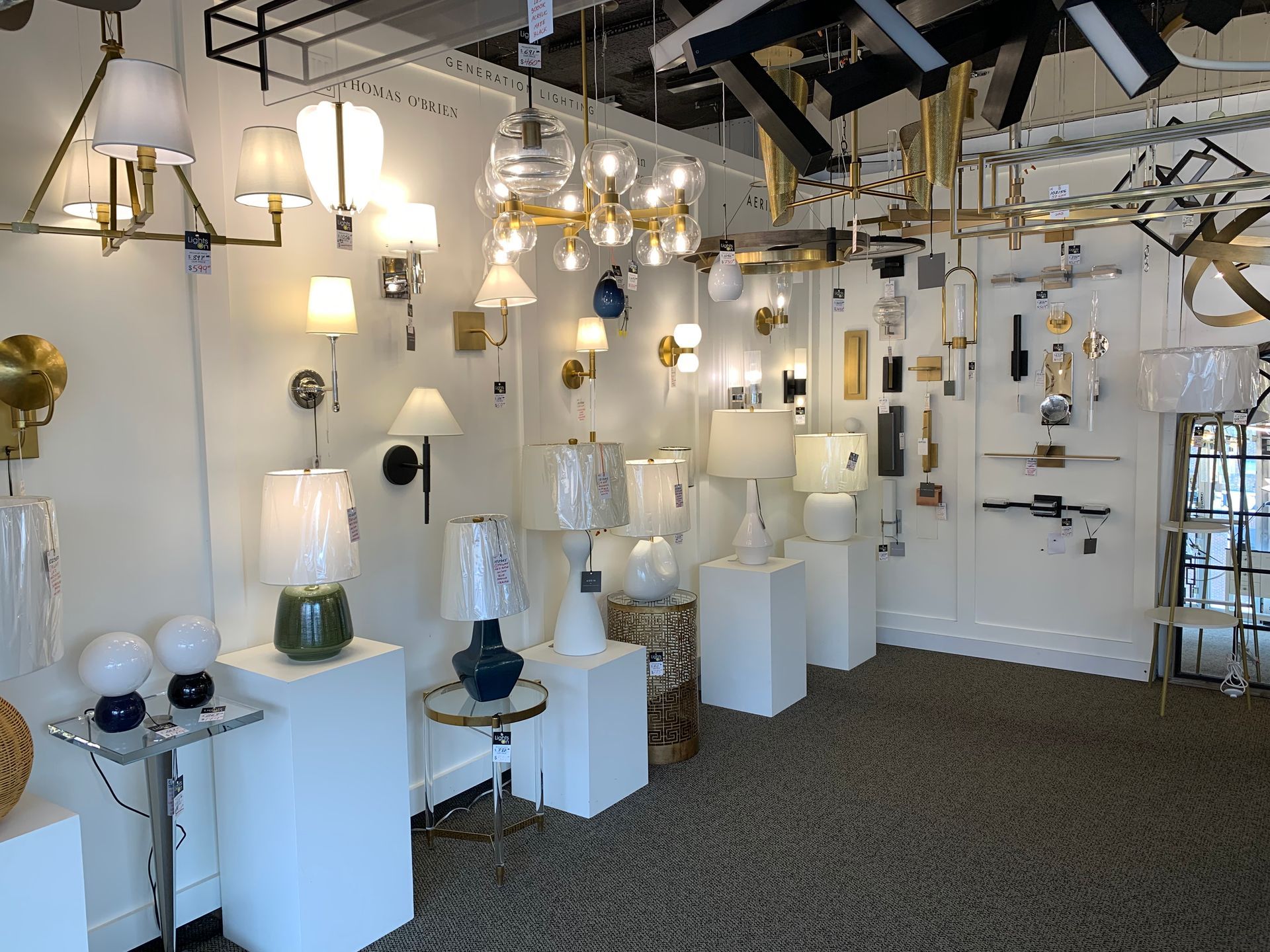 A room filled with lots of lamps and chandeliers.