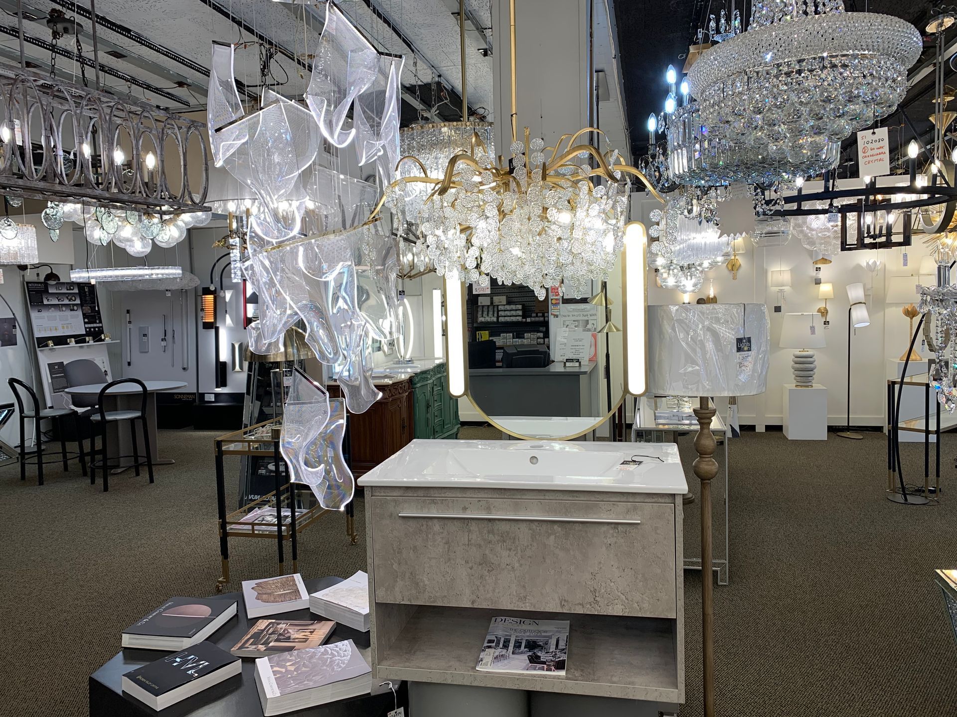 A large room filled with lots of lights and a sink.