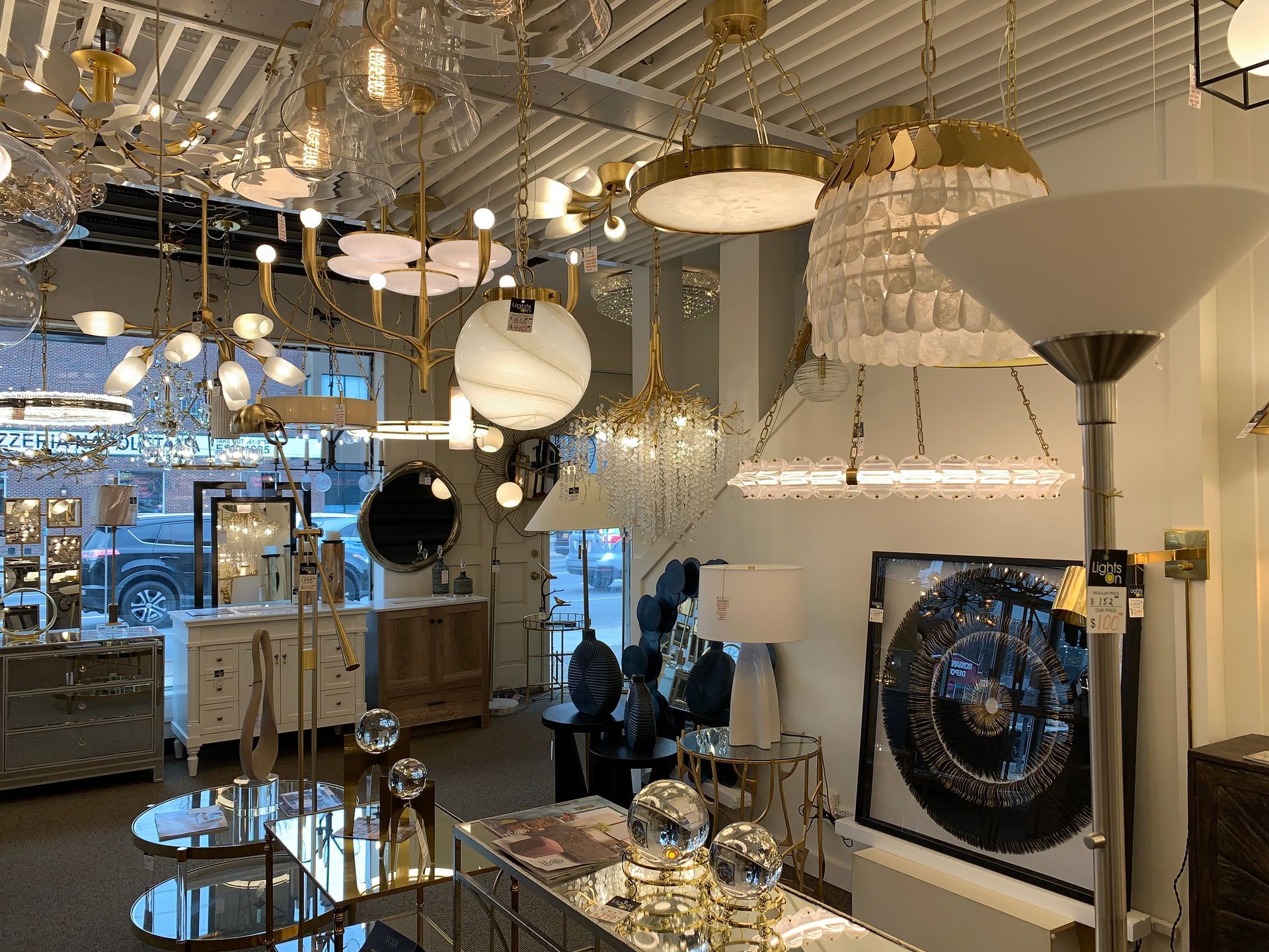 A store filled with lots of lamps and chandeliers.