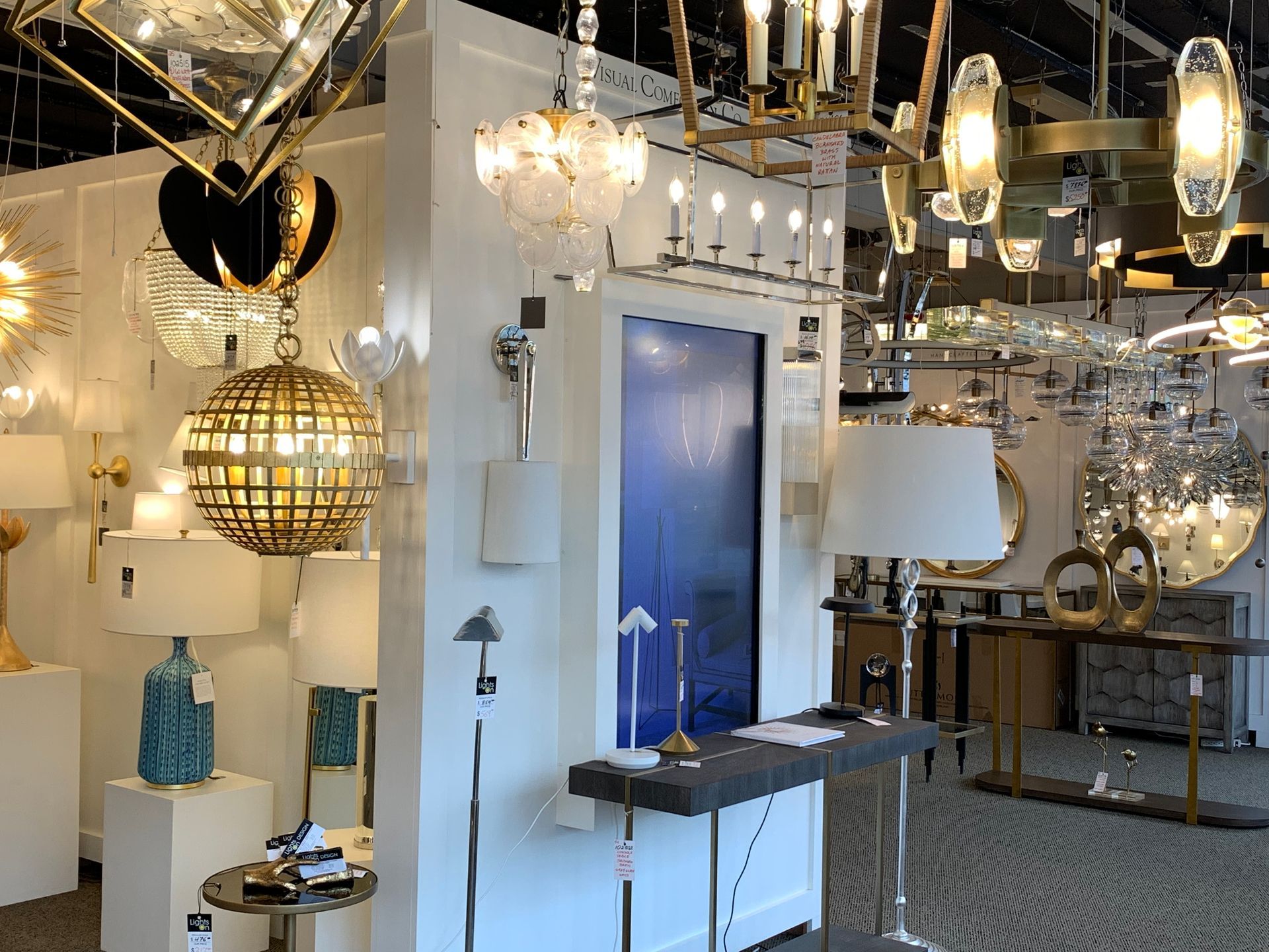 A store filled with lots of lamps and chandeliers.