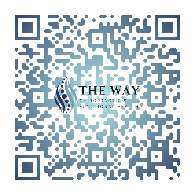 A room with a couch and a table with a roll of paper towels on it