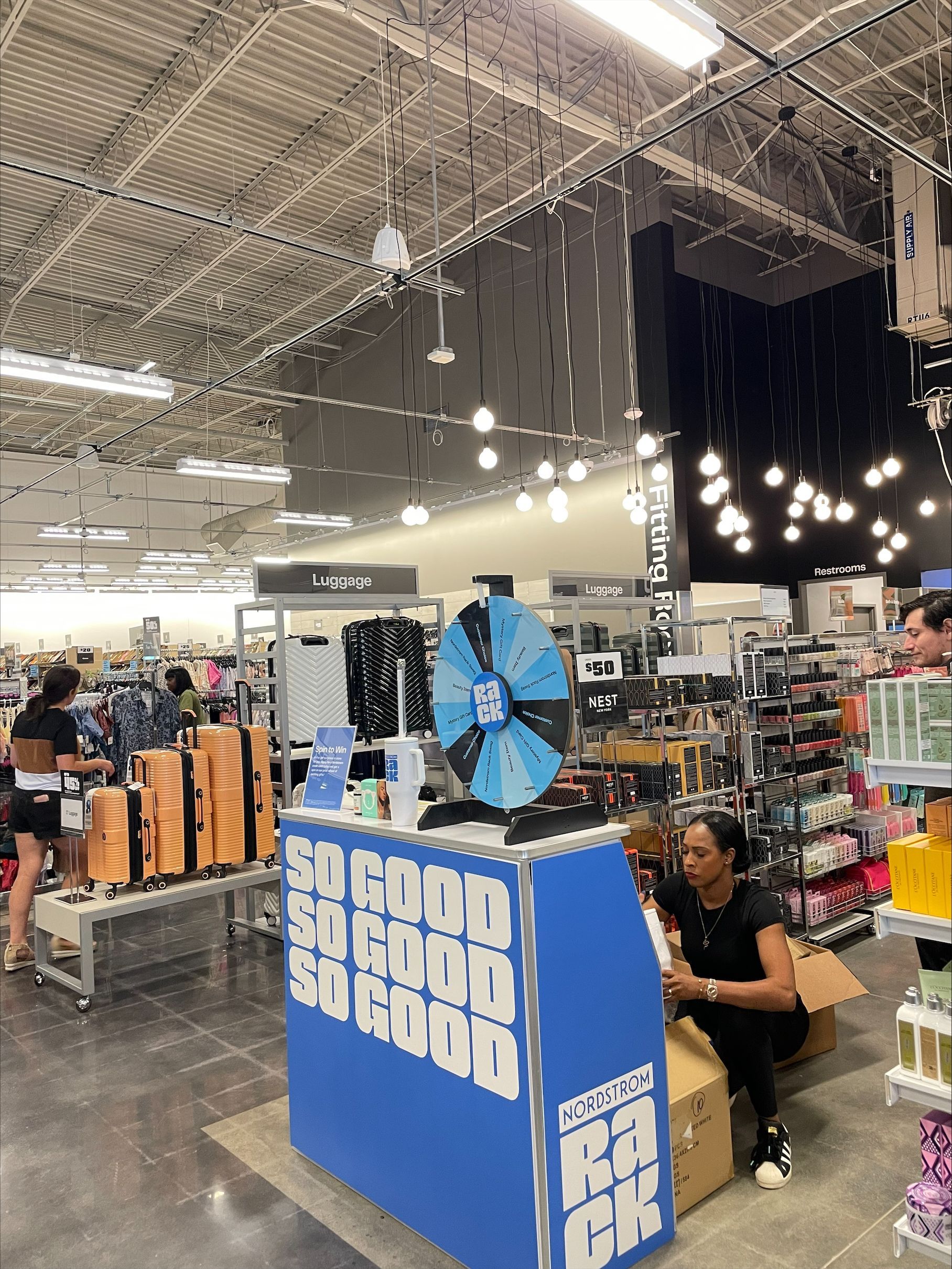 A large room with lots of shelves.