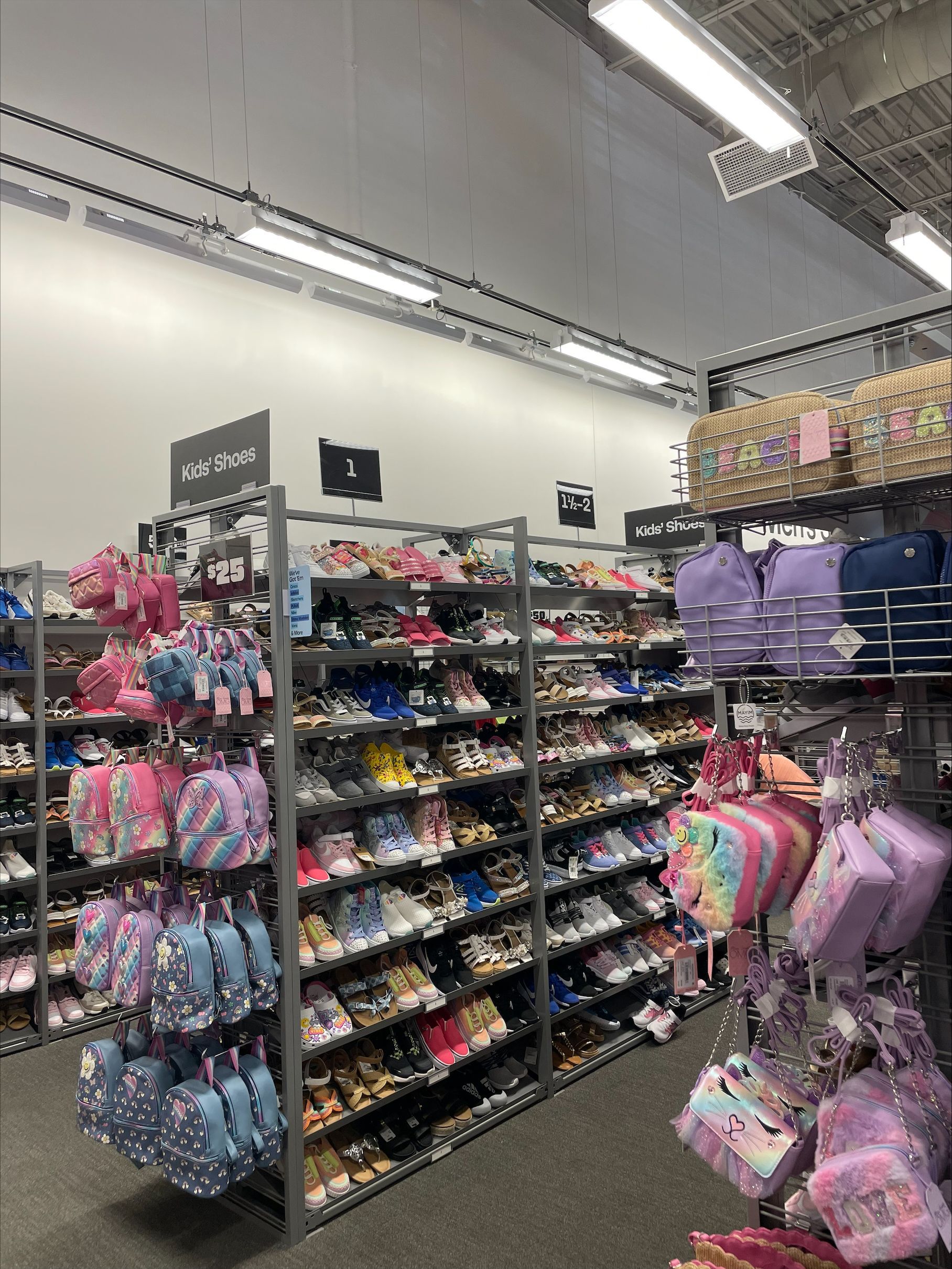 A store filled with lots of bags and shoes.