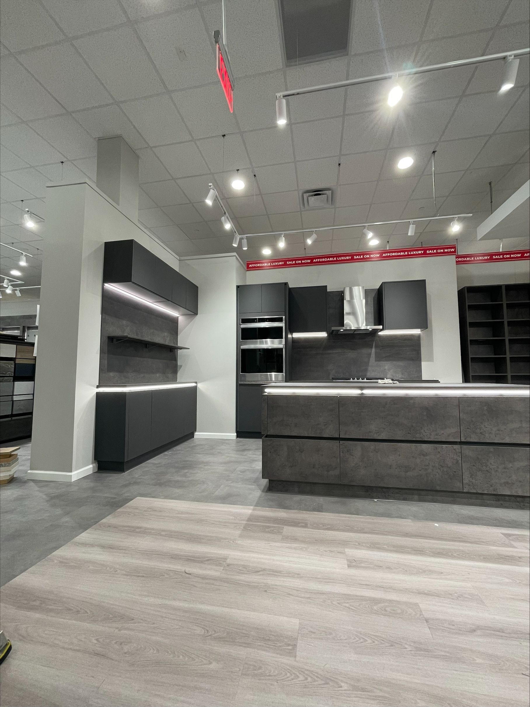 A kitchen with a large island in the middle of it