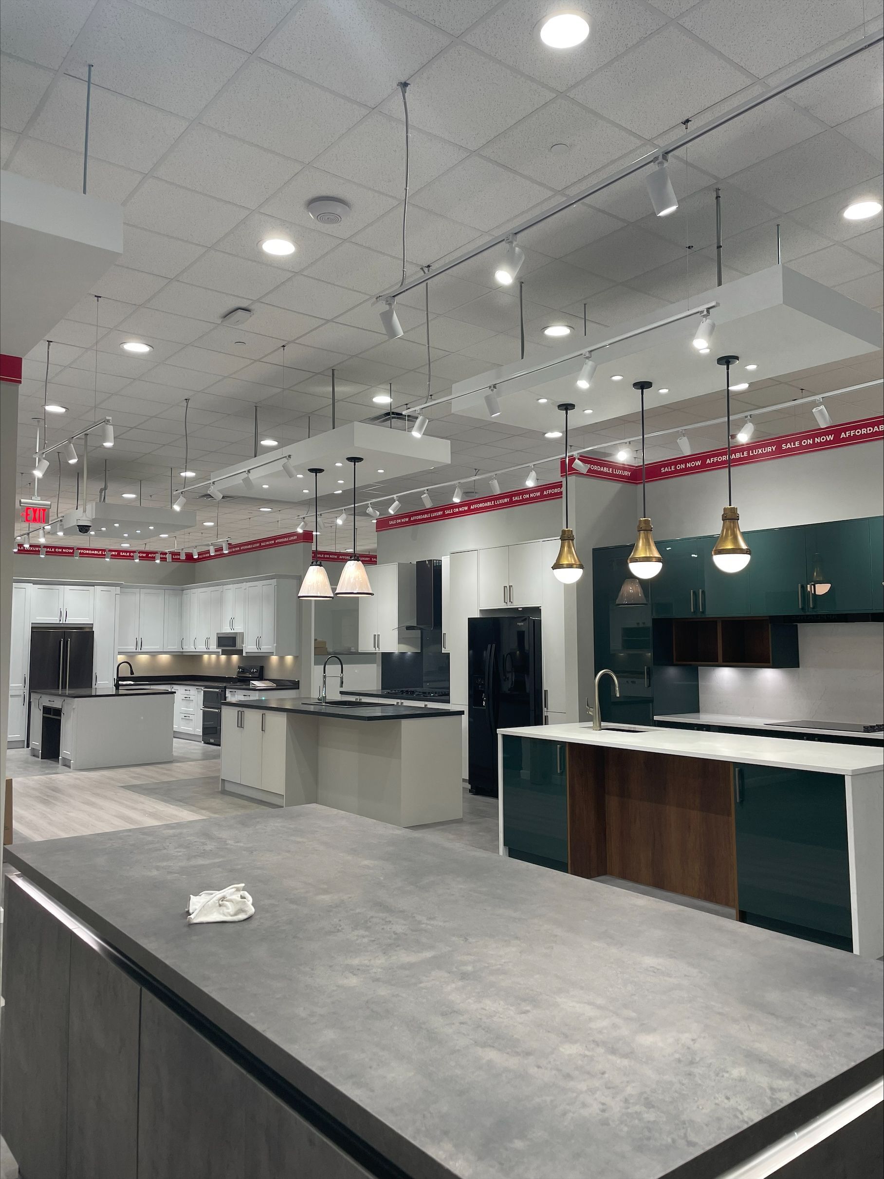 A large kitchen with lots of cabinets and appliances