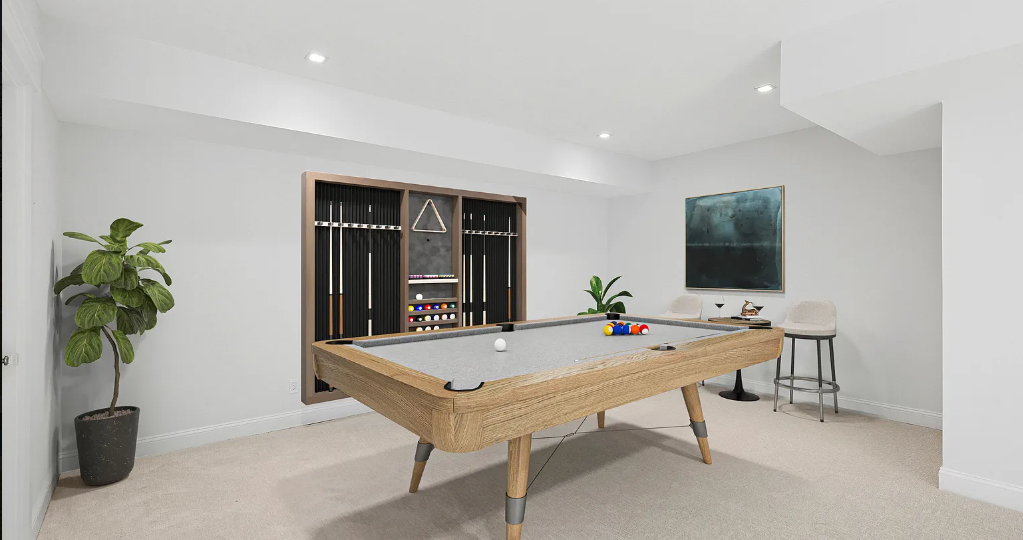 A living room with a couch, chairs, a table and a television.