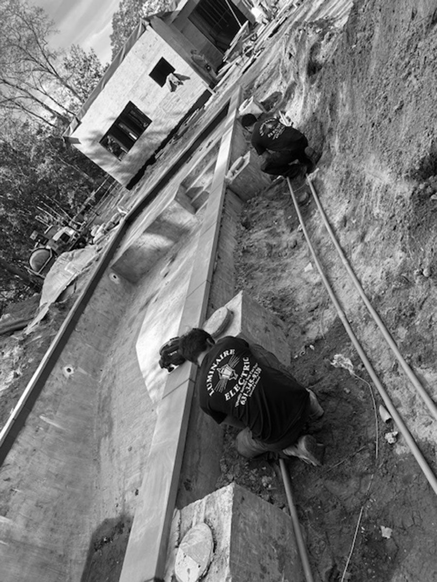 Electricians working on service upgrades