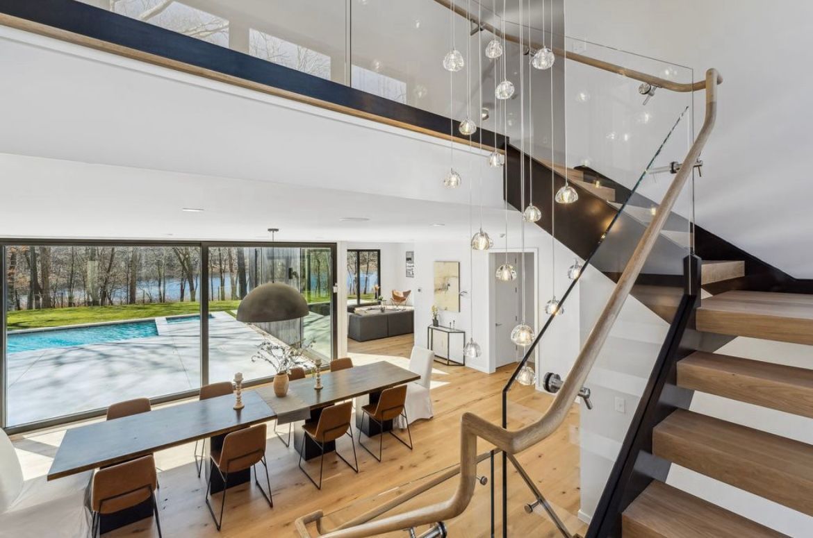 There is a staircase leading up to the second floor of a house